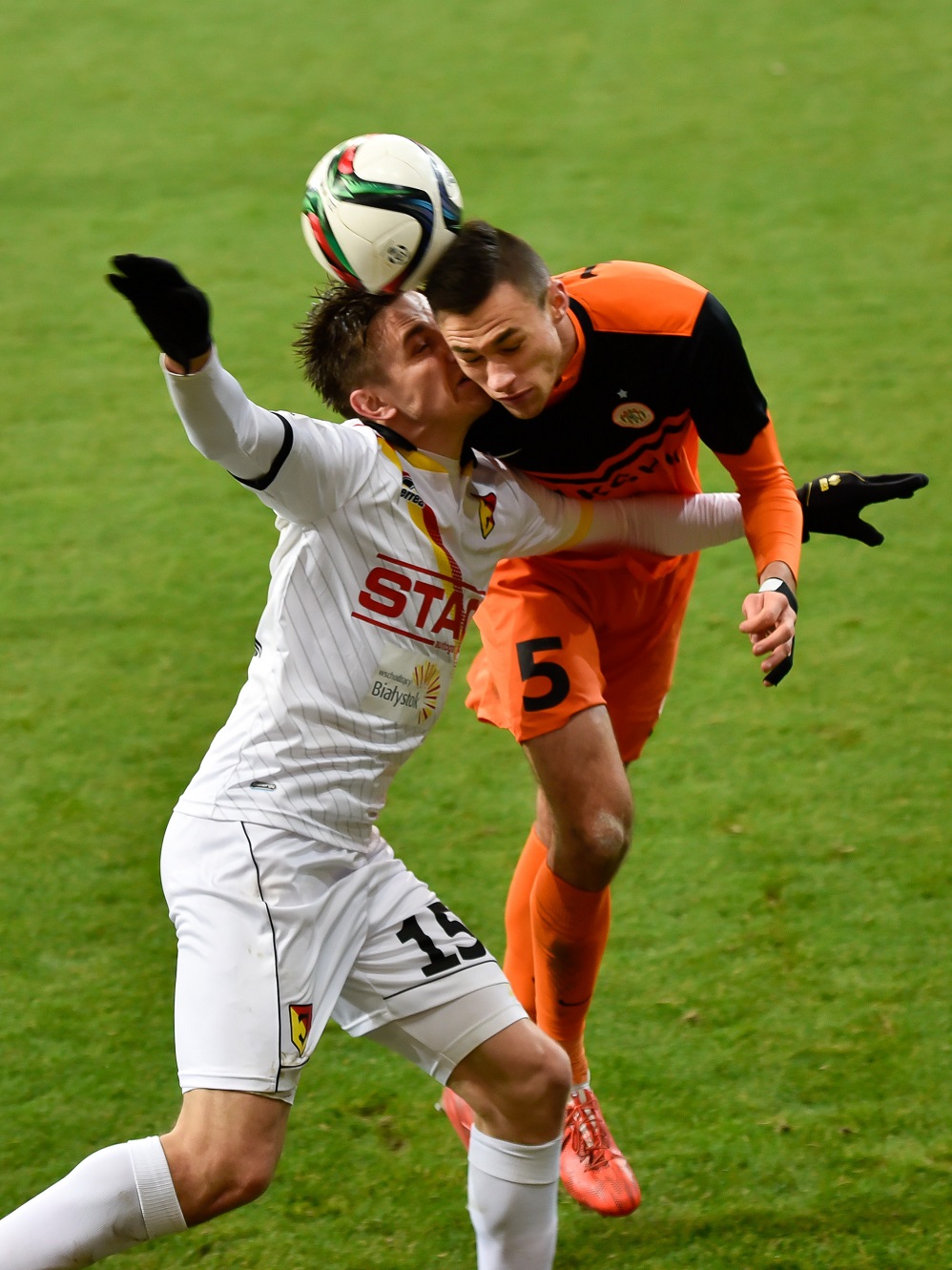 Athletes playing soccer getting tooth knocked out